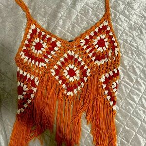 Orange knitted top has never been worn